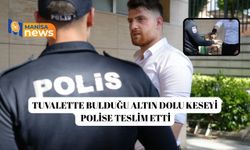 Tuvalette bulduğu altın dolu keseyi polise teslim etti
