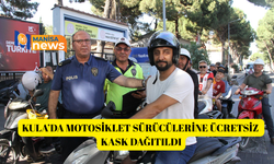 Kula’da motosiklet sürücülerine ücretsiz kask dağıtıldı