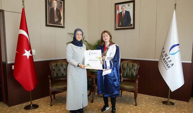 Rektör Kibar Dünya Şampiyonu Büber'i makamında ağırladı